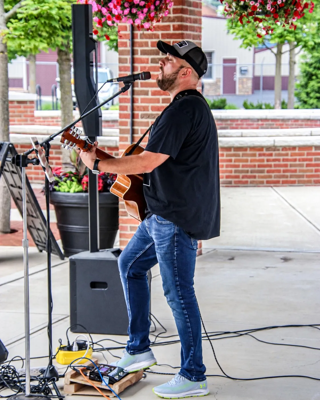 Tommy Renfro performing an outdoor acoustic set